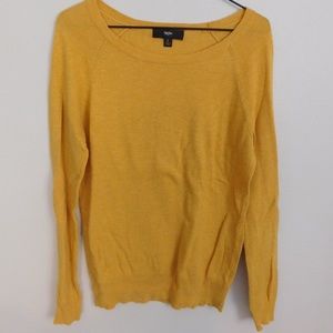 yellow sweater